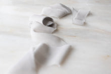 Load image into Gallery viewer, pale grey silk ribbon on a wooden spool