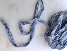 Load image into Gallery viewer, ten yard bundle upcycled silk sari ribbon in a beautiful periwinkle blue