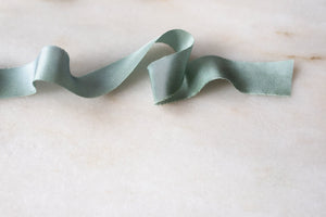 White, narrow silk ribbon